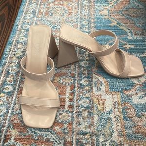 Nude triangle heel